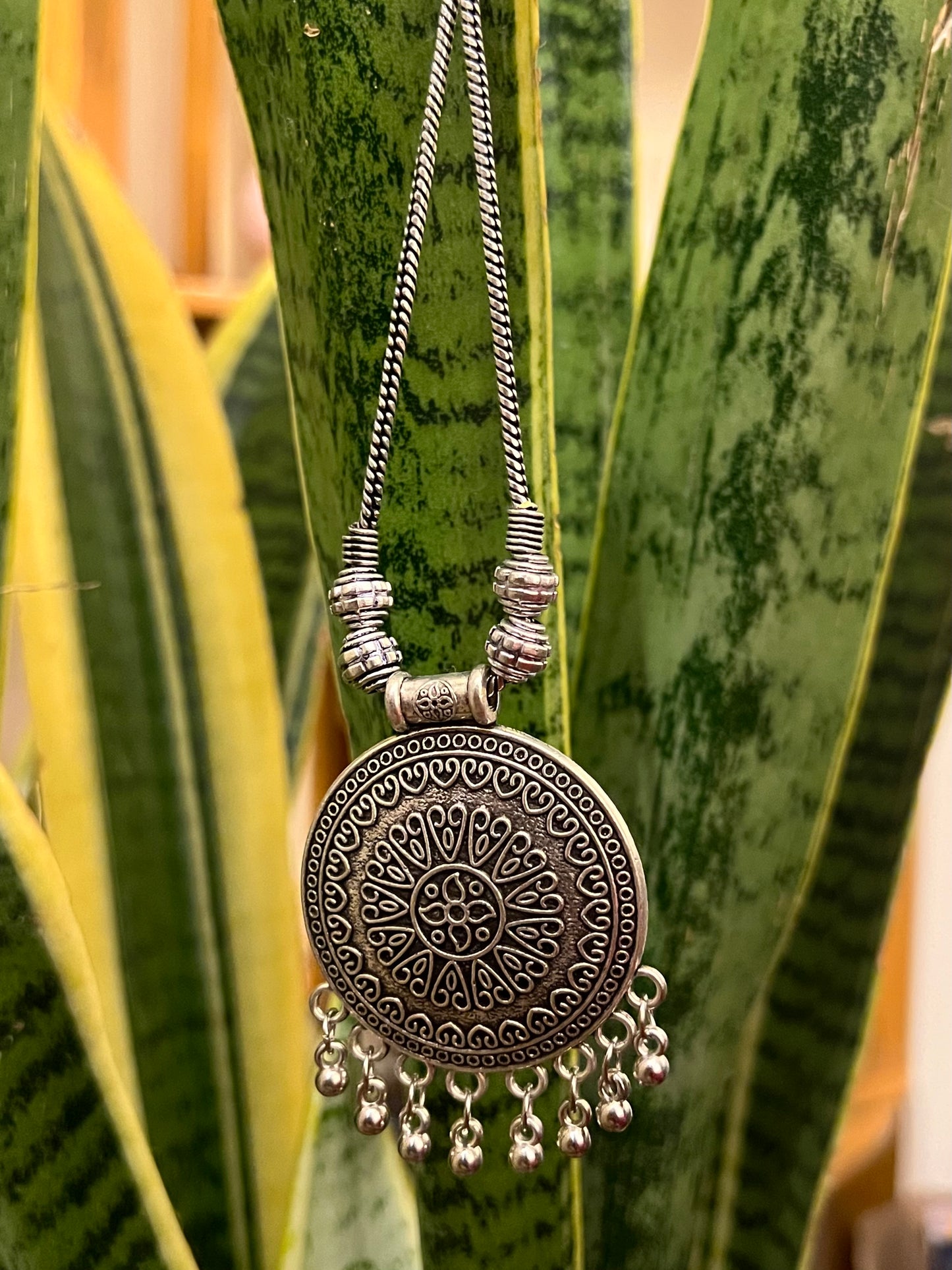 Small circular pendant