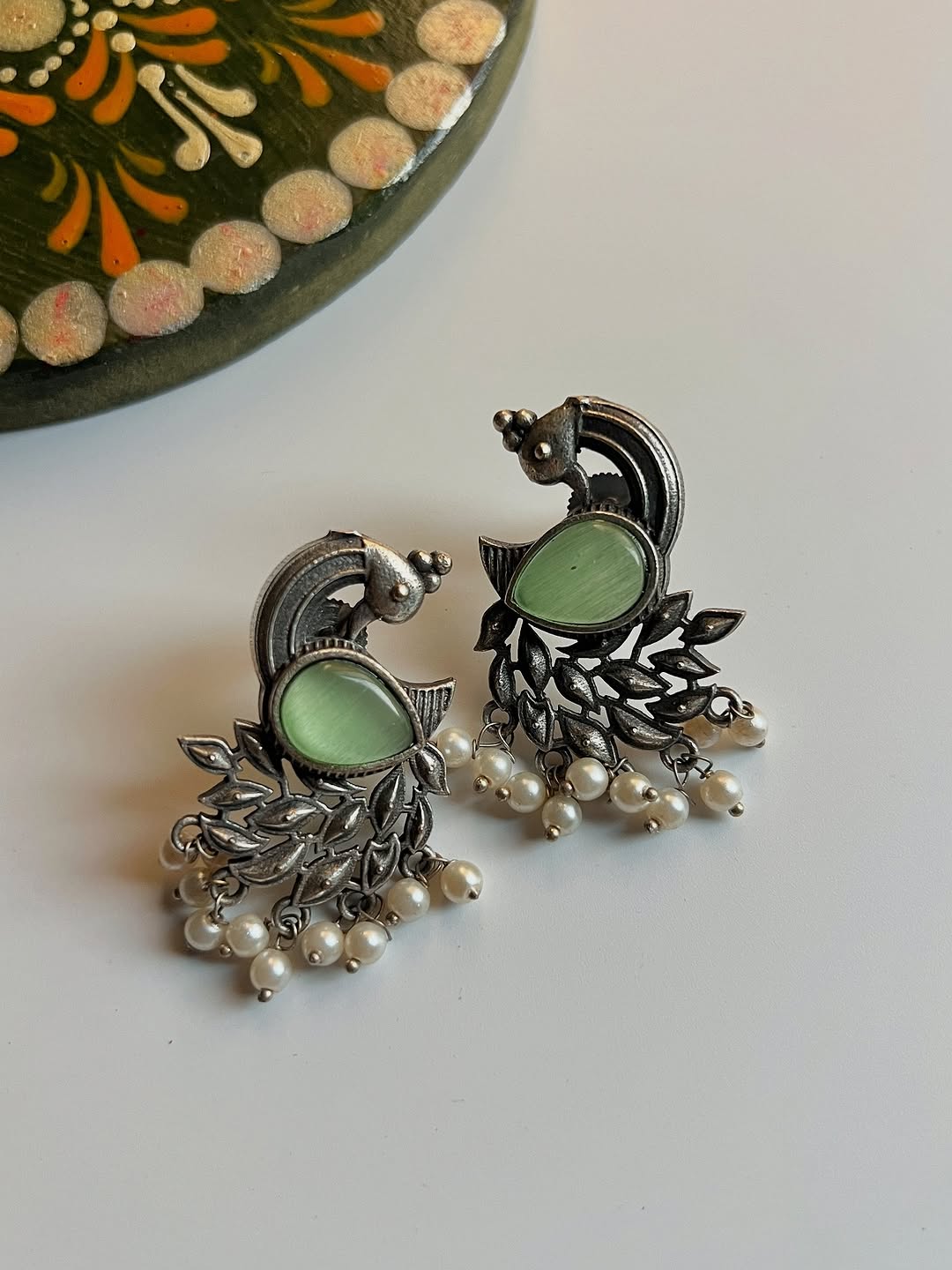 Peacock studs