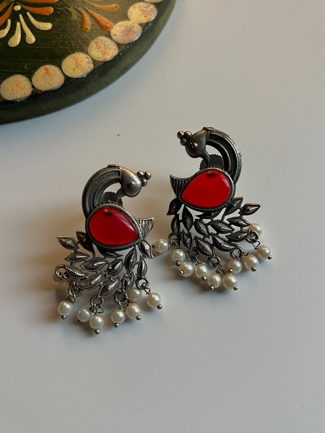 Peacock studs