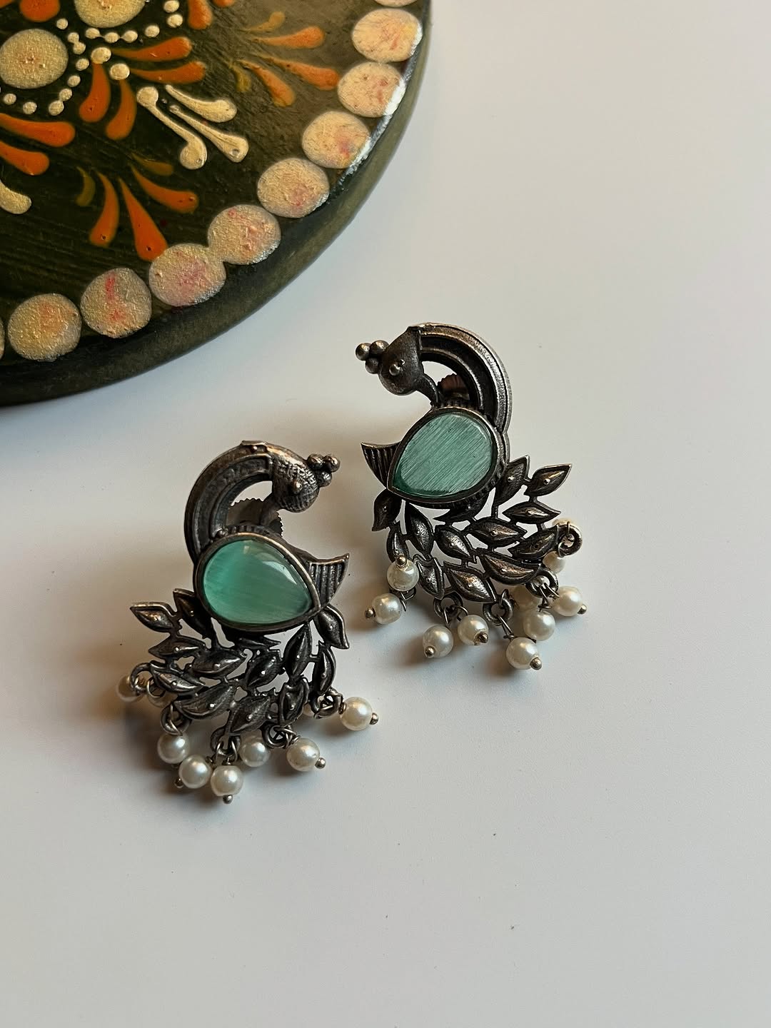Peacock studs