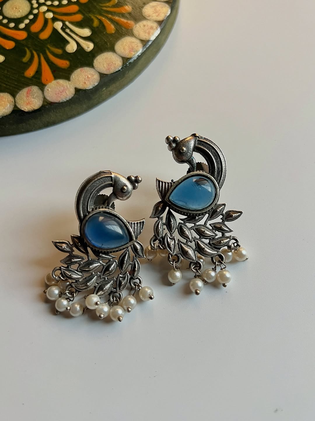 Peacock studs