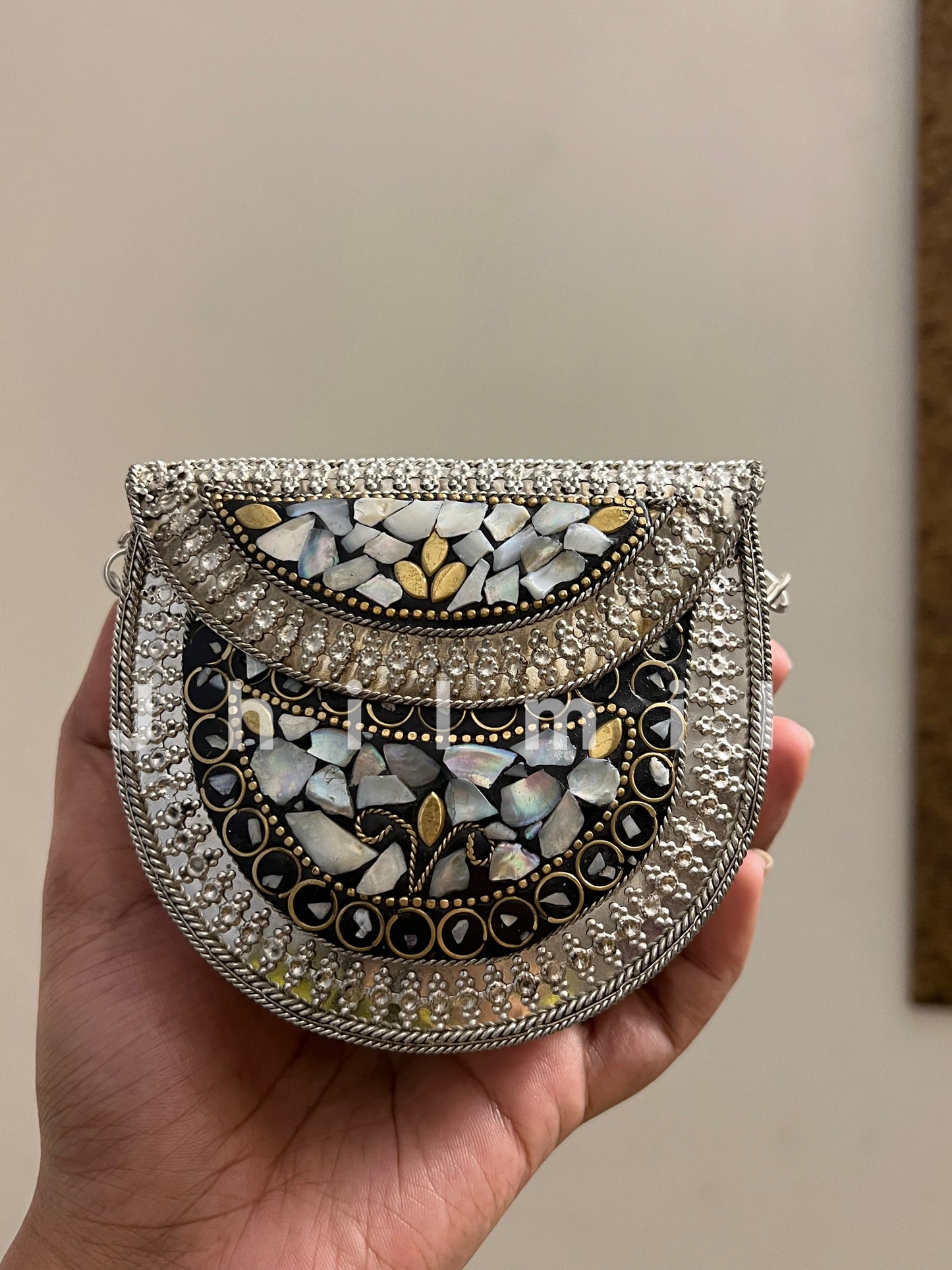 Silver Seep Metal Clutch