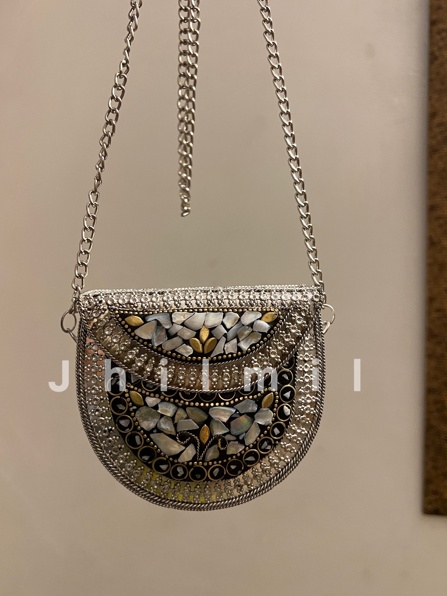 Silver Seep Metal Clutch