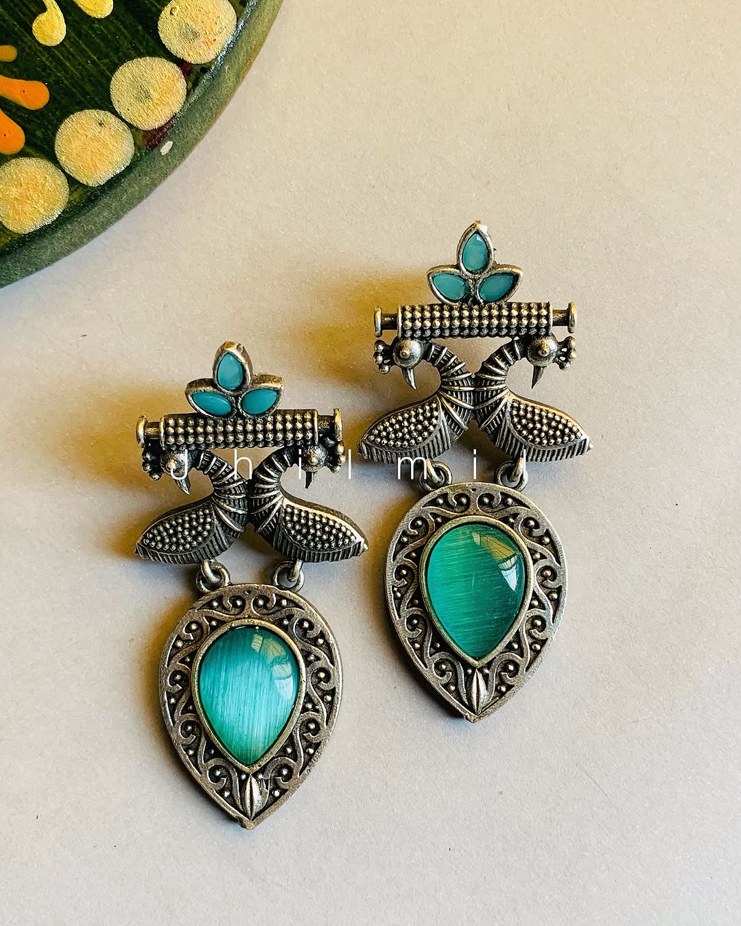 Peacock motif stone drop Ear candy