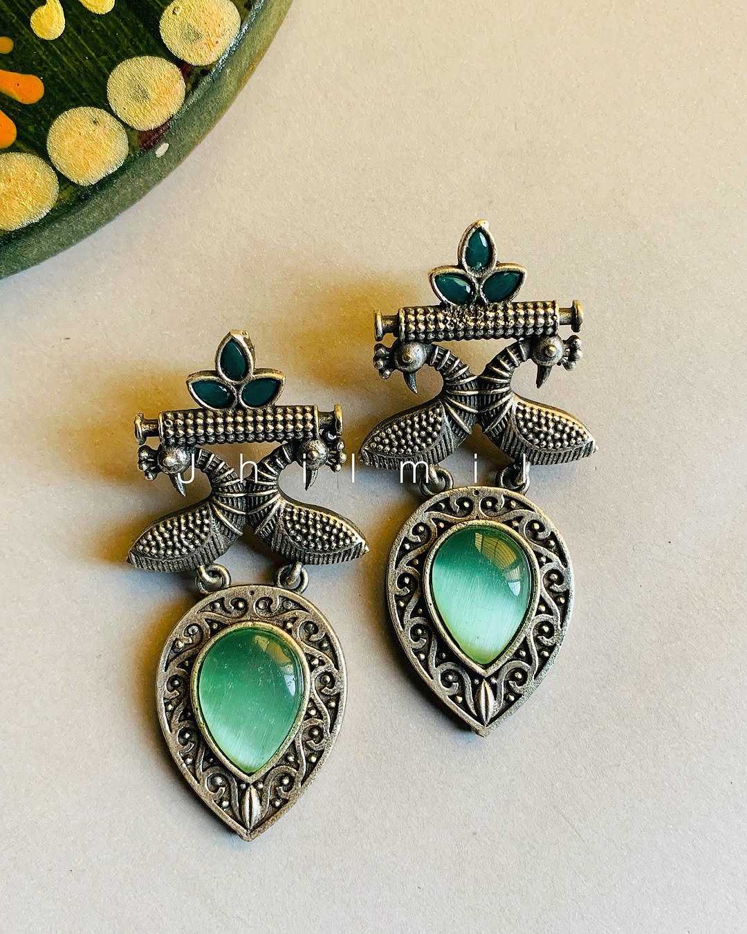 Peacock motif stone drop Ear candy