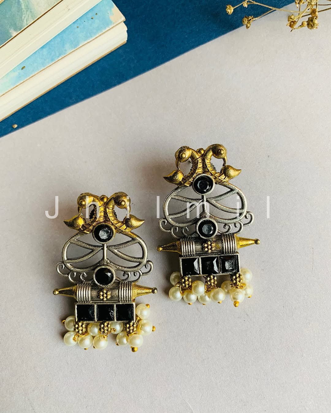 Elephant Motif Dual Toned Stud