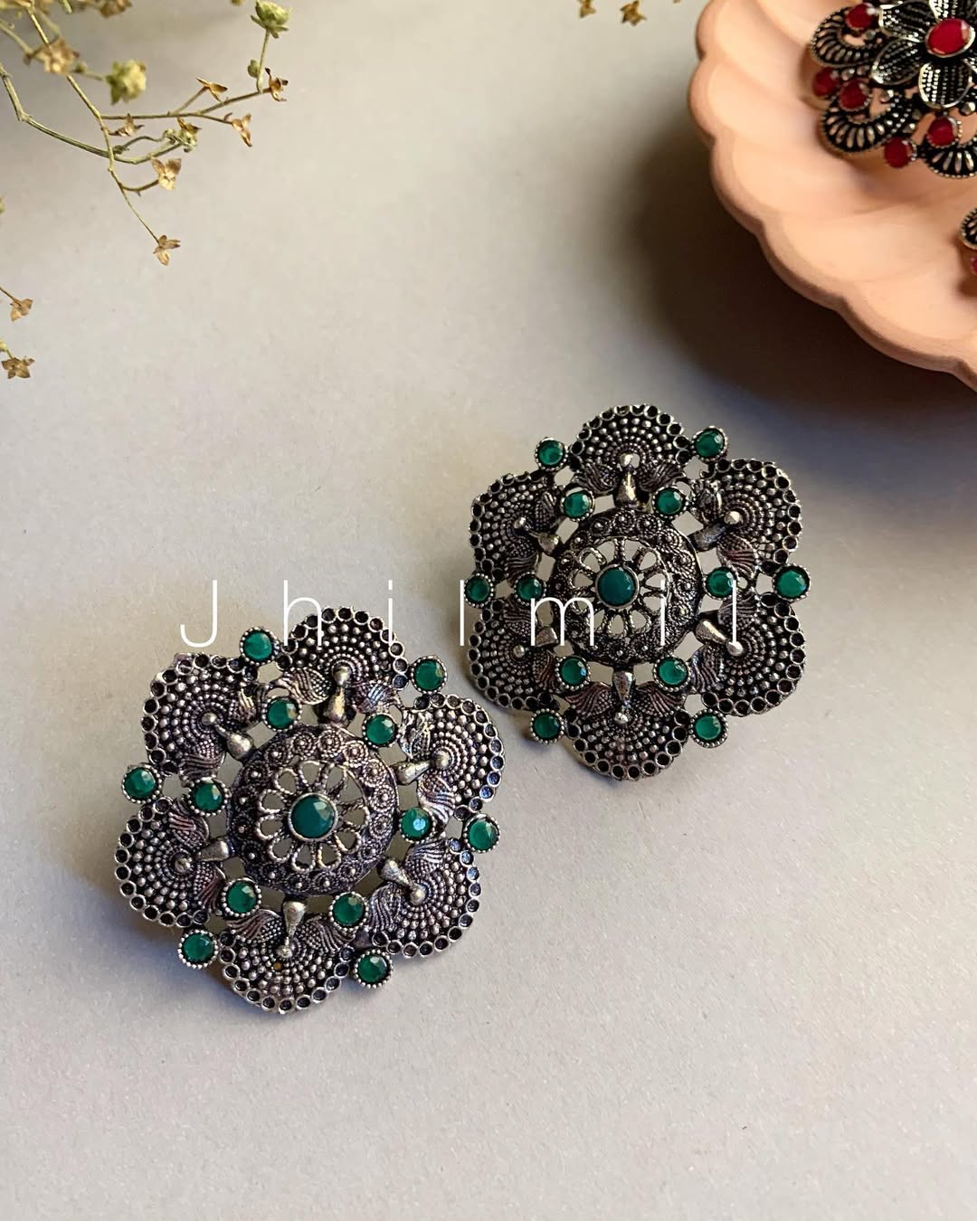 Peacock motif oxidized Studs