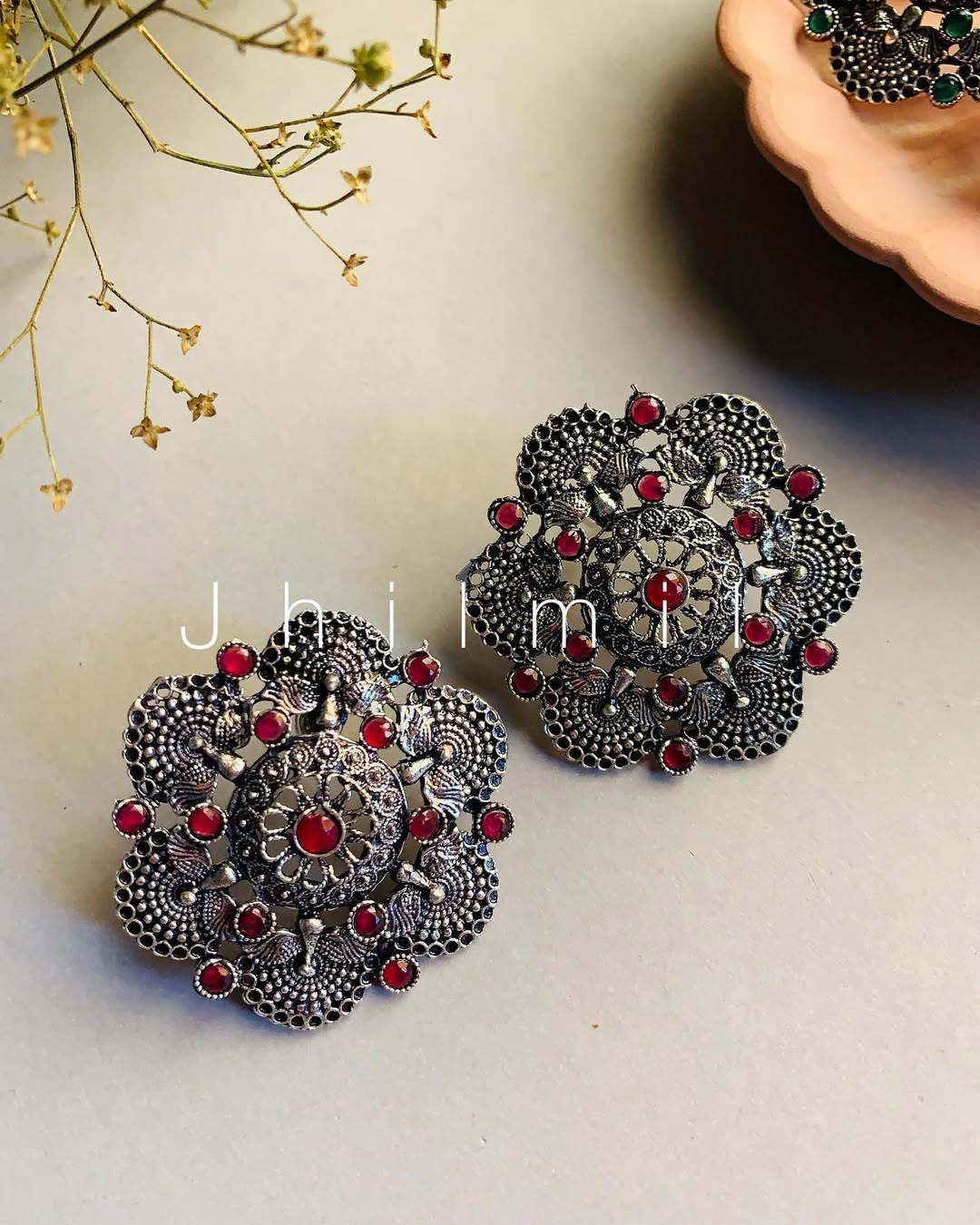 Peacock motif oxidized Studs