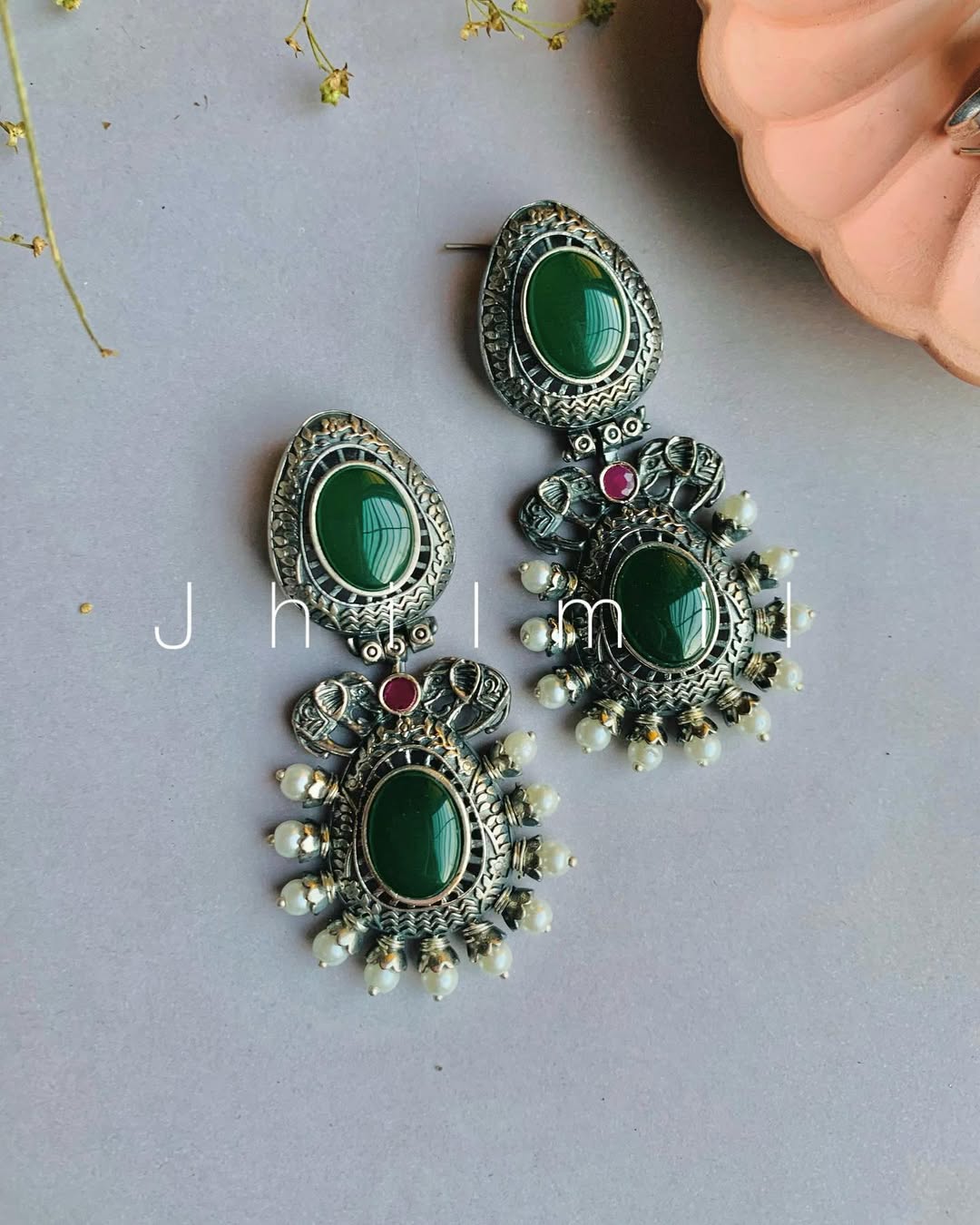 Elephant motif designer look earrings