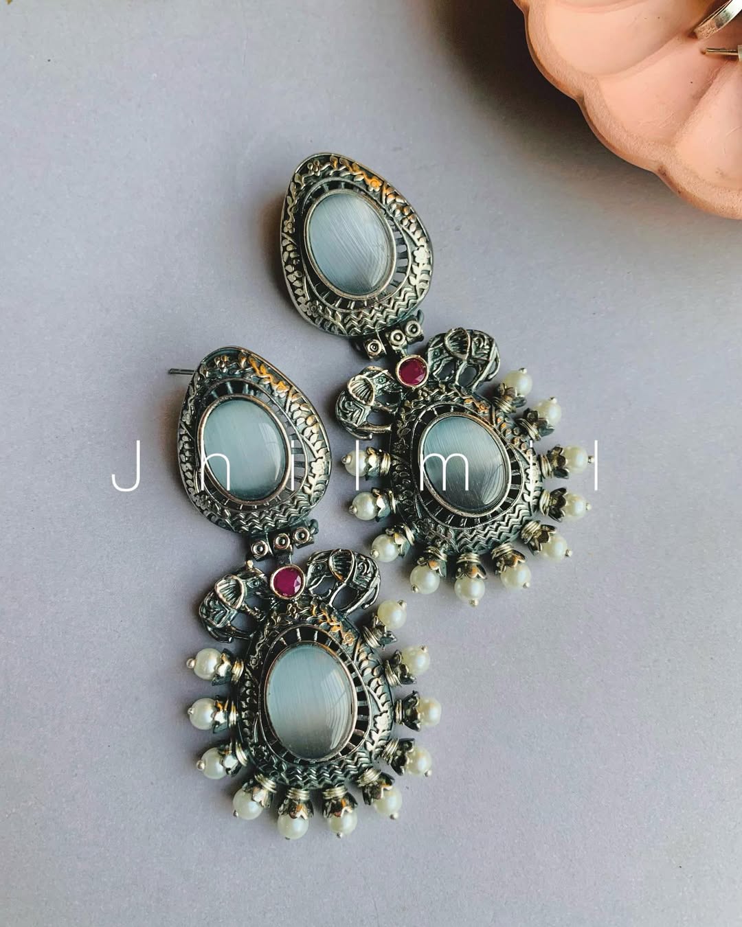Elephant motif designer look earrings