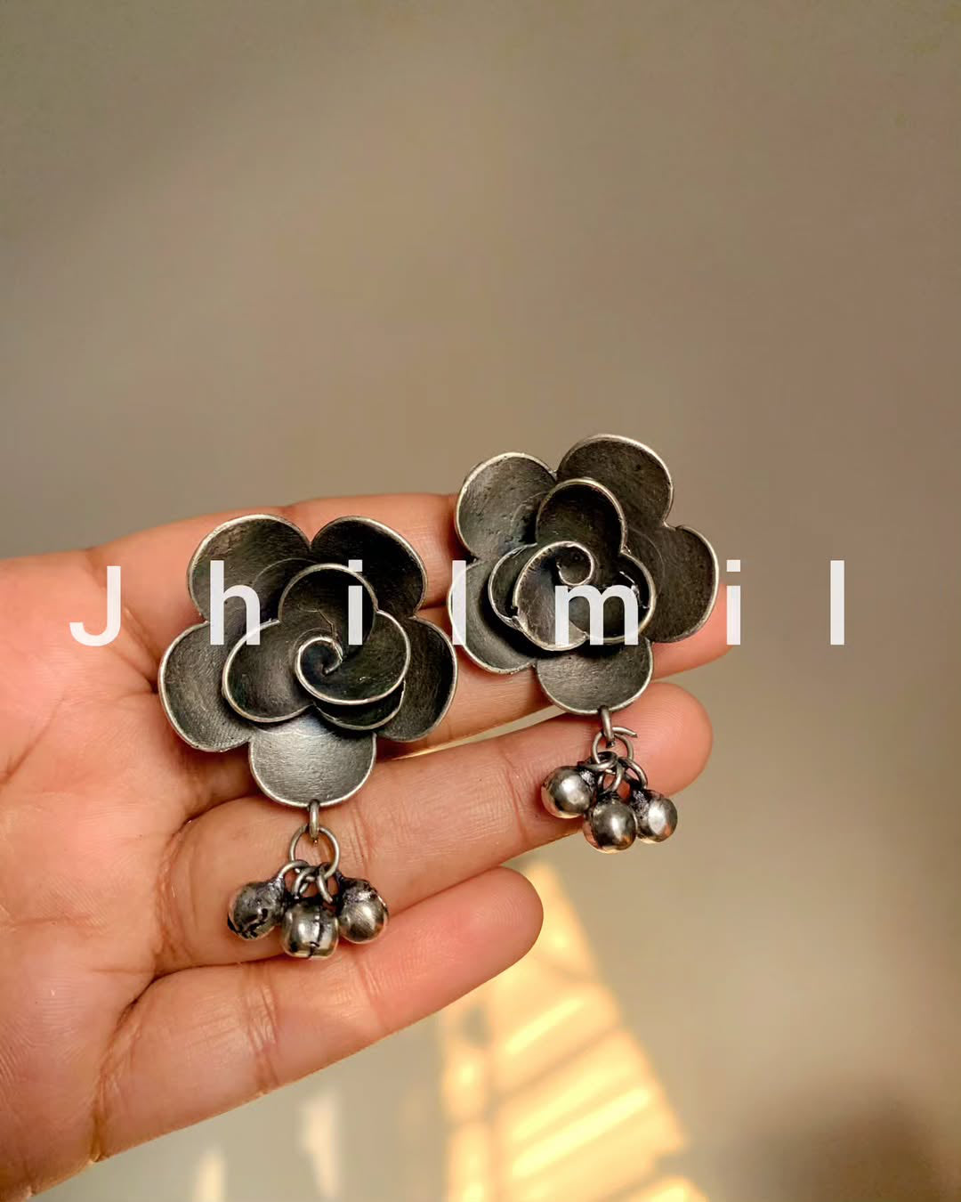 Antique flower studs embellished with ghungroo