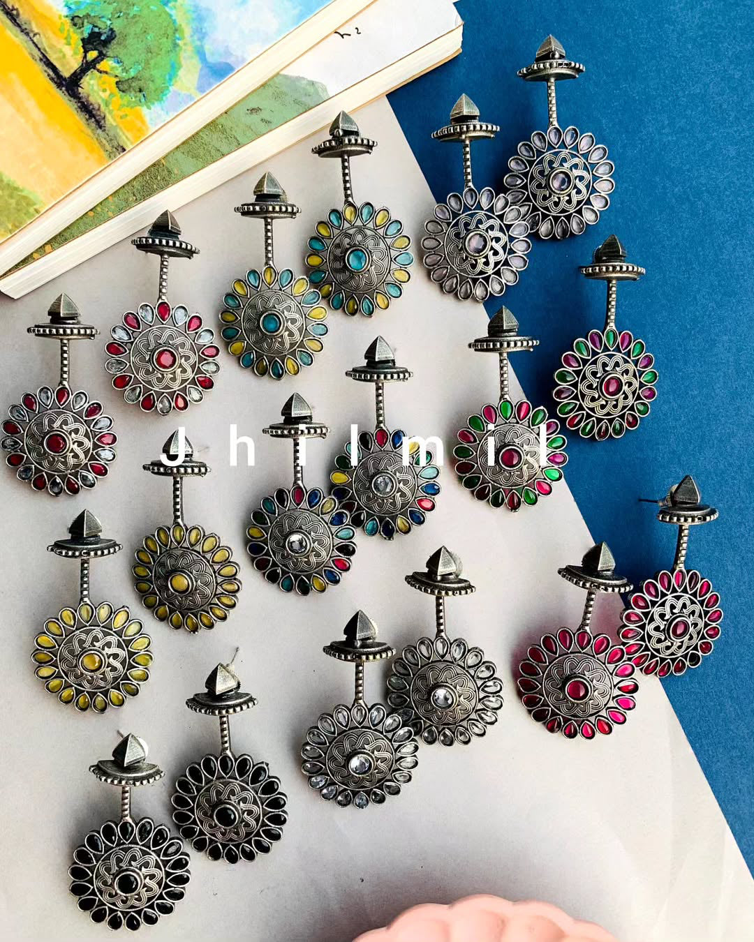 Stone embellished flower drop danglers