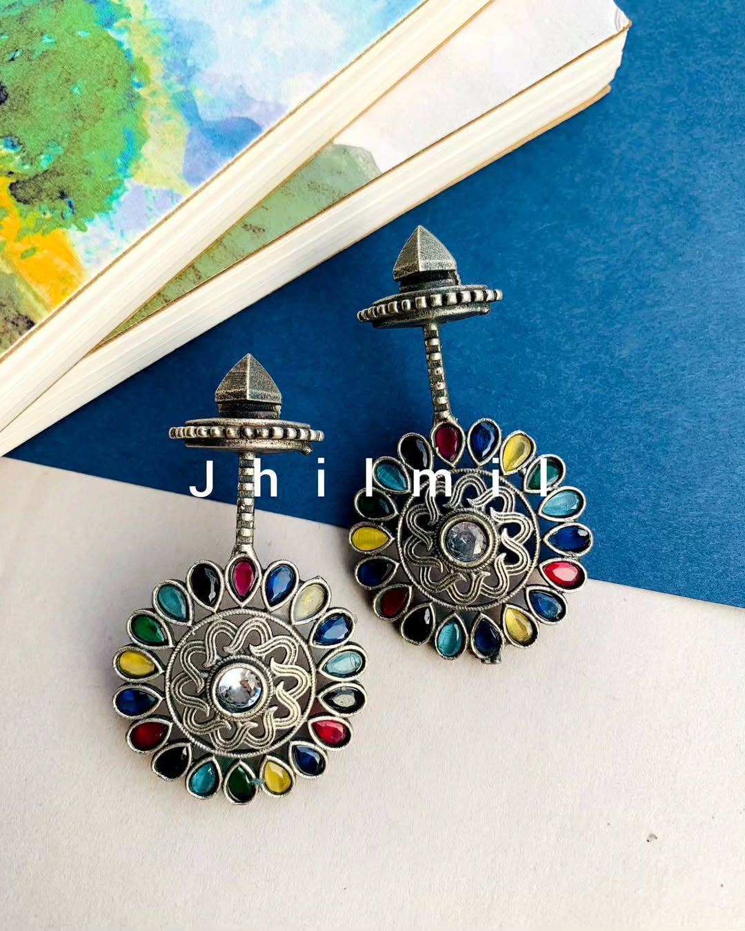 Stone embellished flower drop danglers