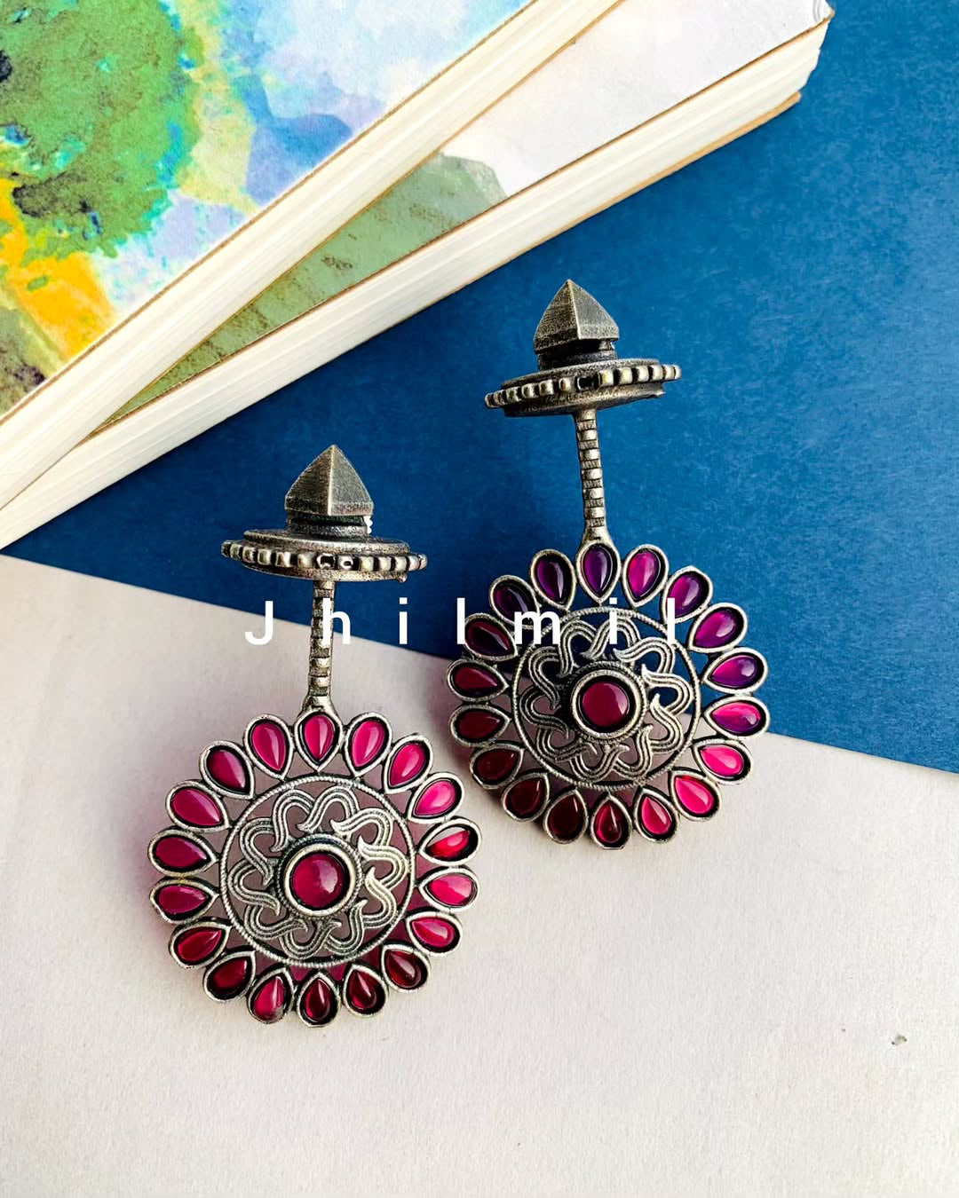 Stone embellished flower drop danglers