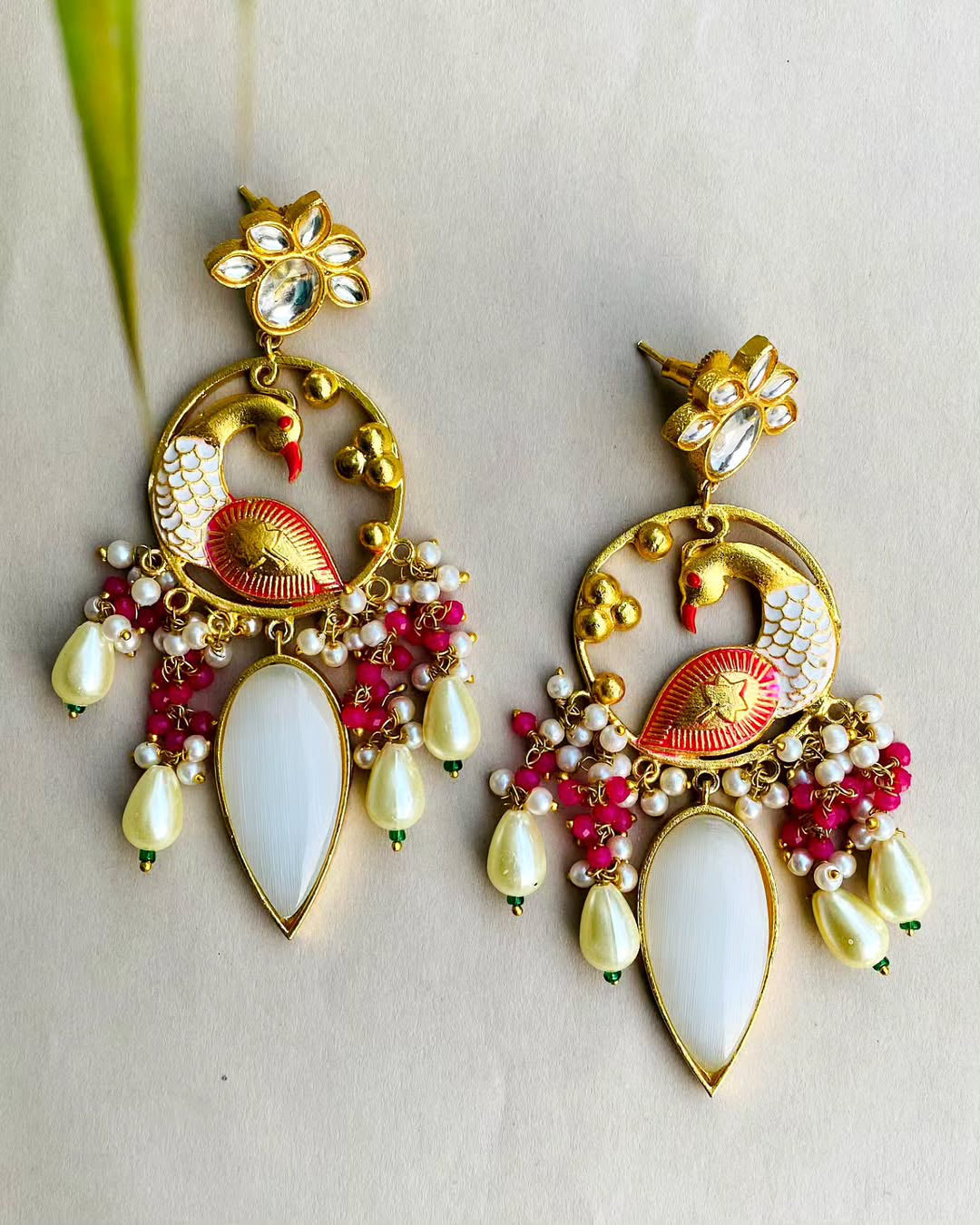 Gold plated kundan peacock earrings