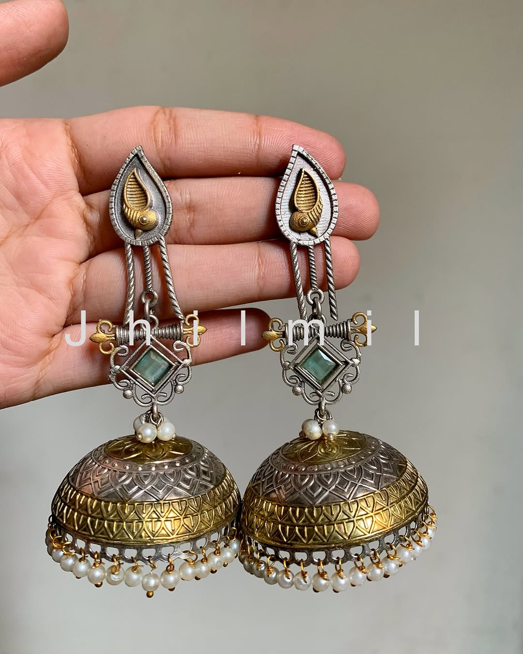 Dazzling oversized dual tone Jhumkas