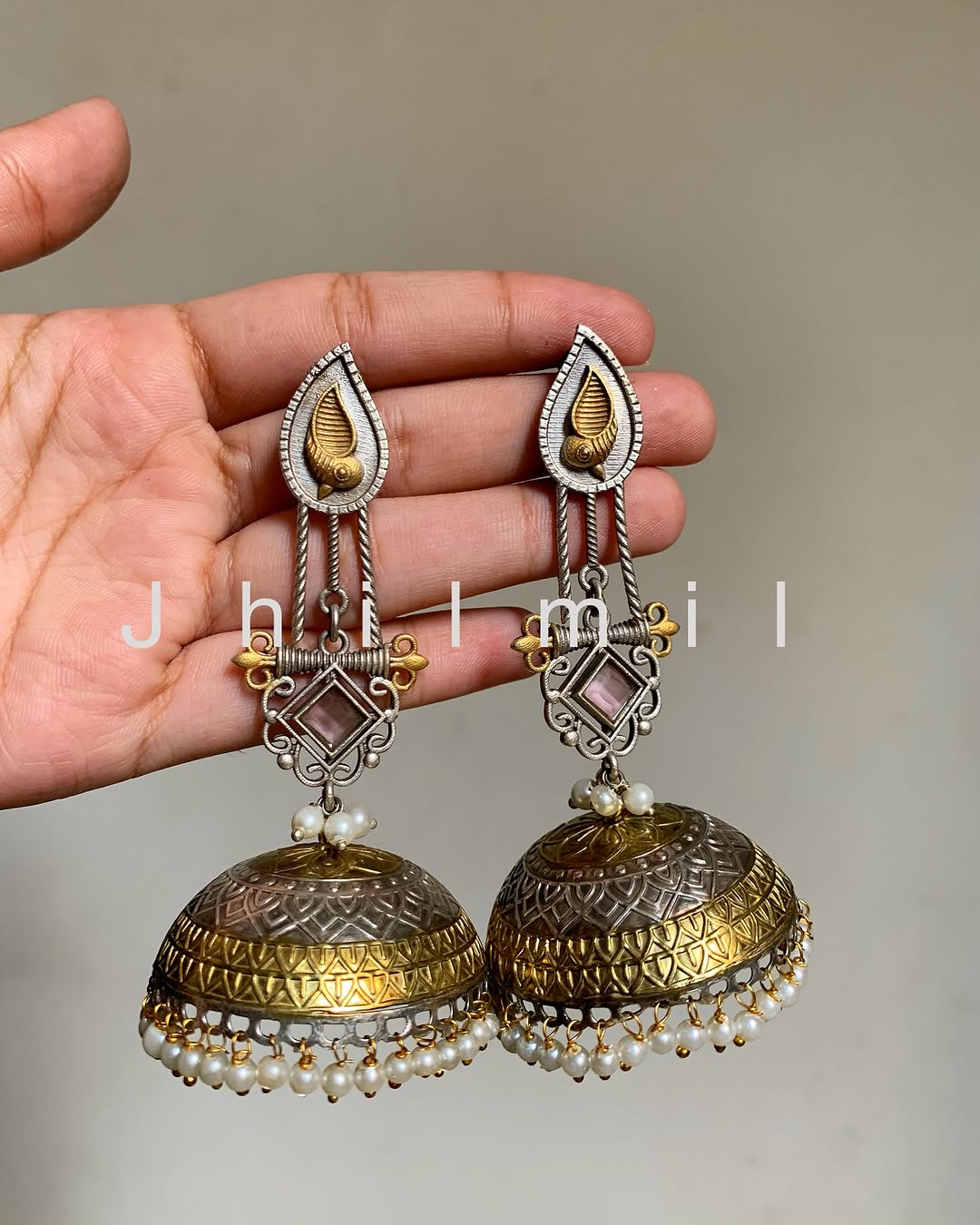 Dazzling oversized dual tone Jhumkas