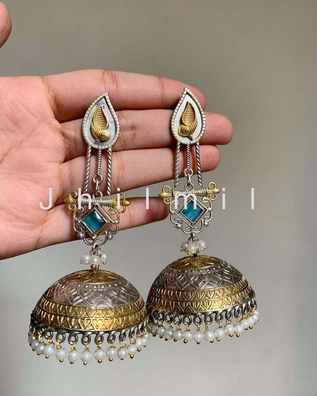 Dazzling oversized dual tone Jhumkas