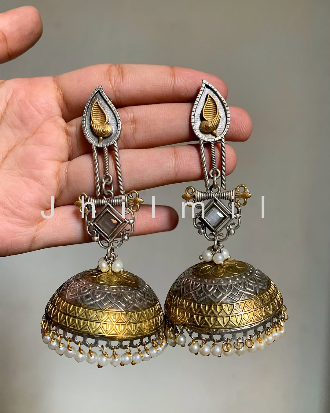 Dazzling oversized dual tone Jhumkas