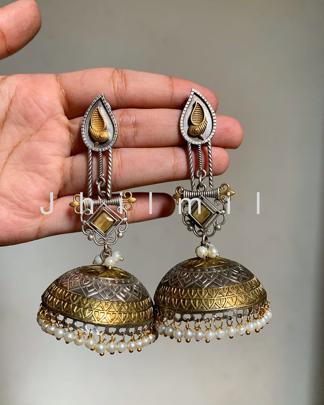 Dazzling oversized dual tone Jhumkas