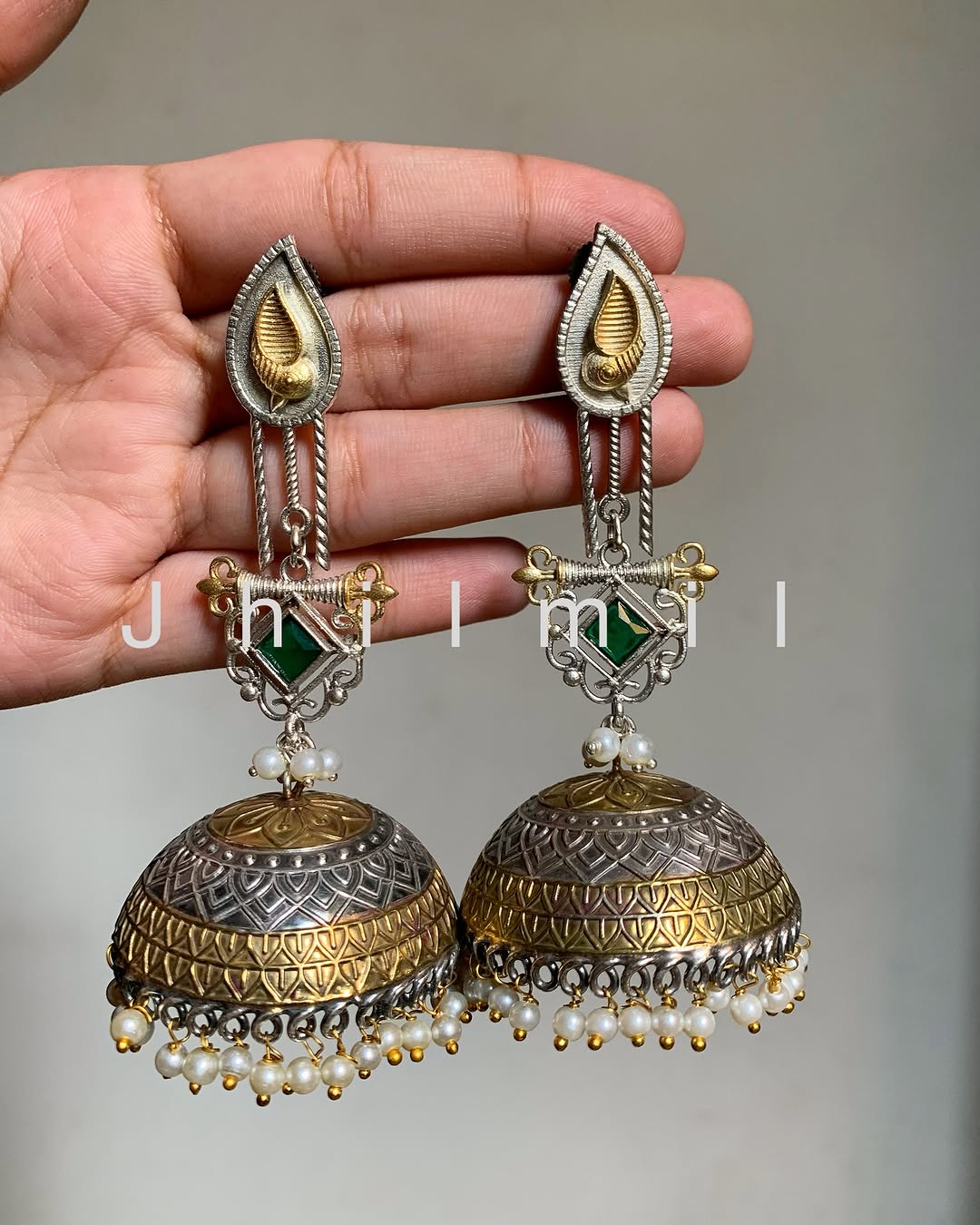 Dazzling oversized dual tone Jhumkas