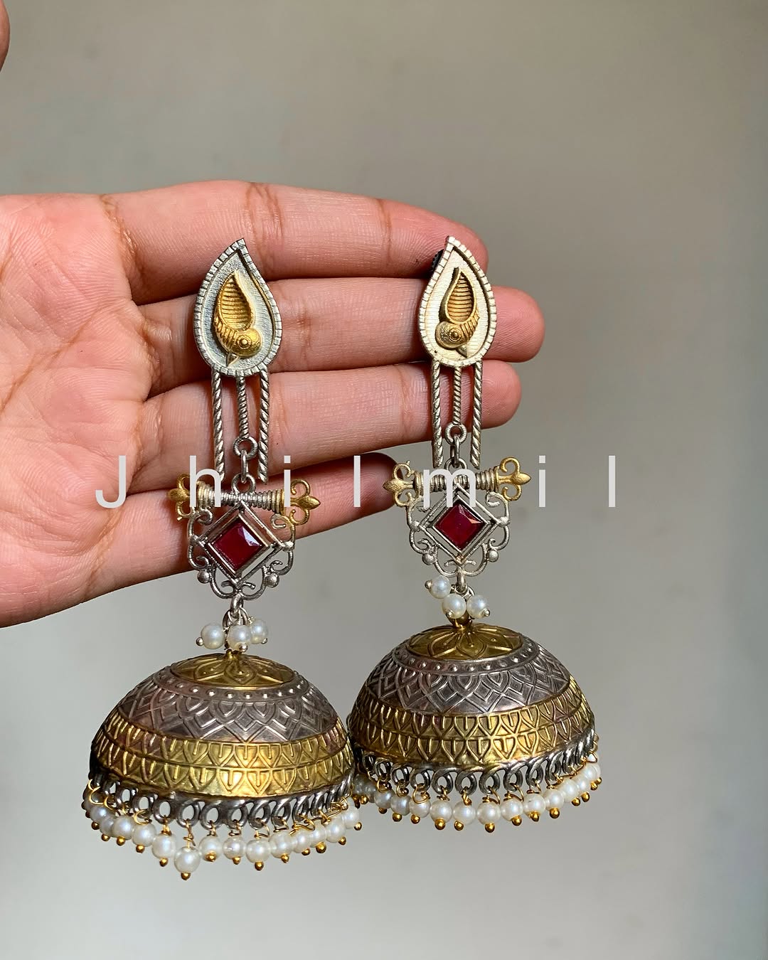 Dazzling oversized dual tone Jhumkas
