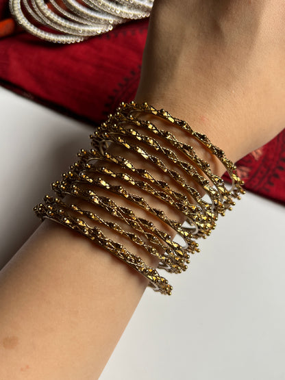 Golden Zig Zag Dotted Bangles