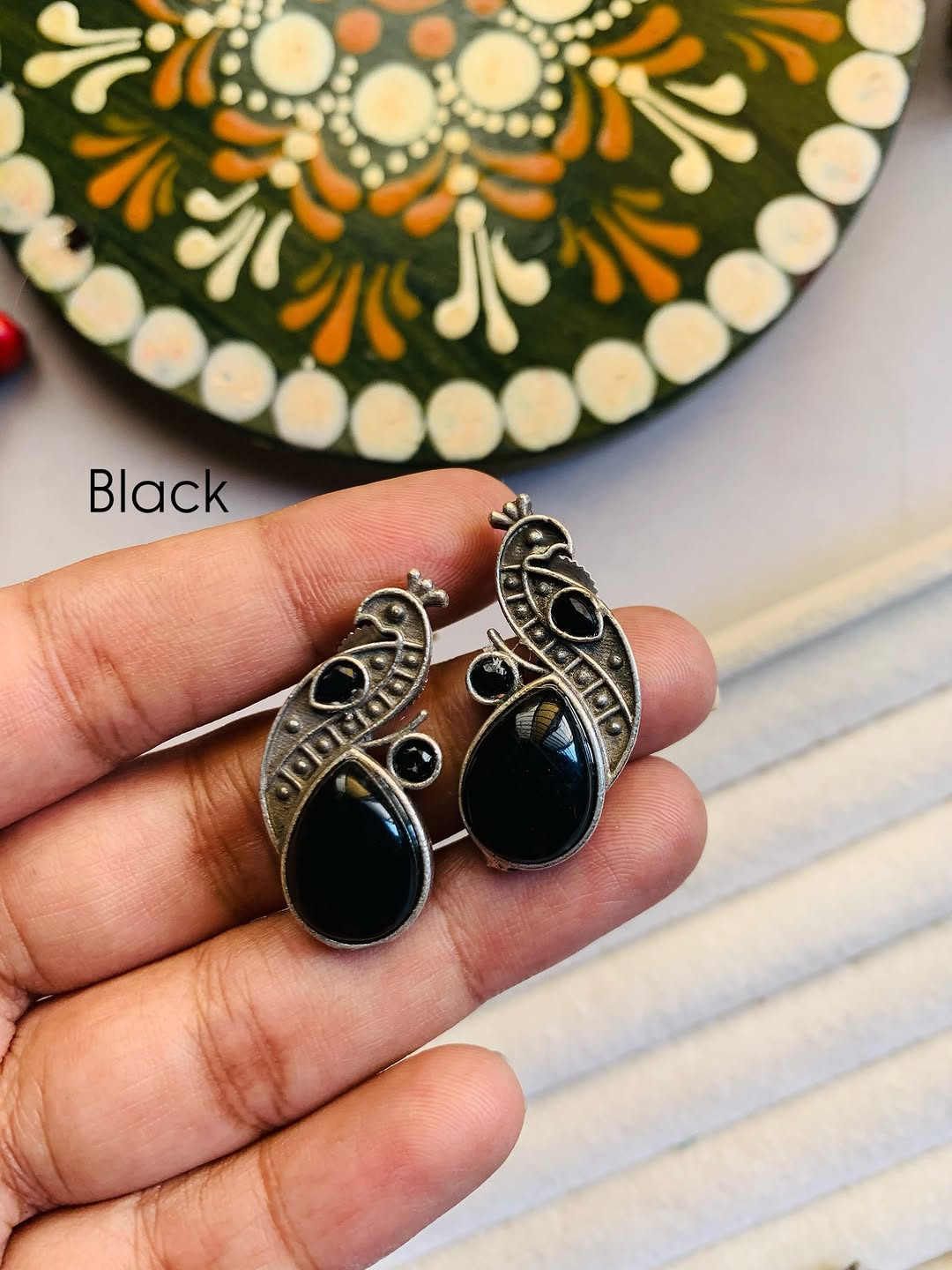 Mini peacock studs