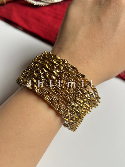 Golden Zig Zag Dotted Bangles