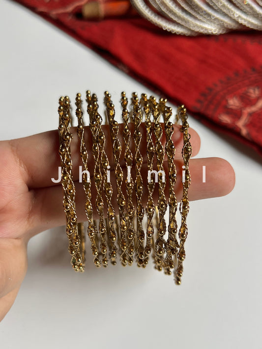 Golden Zig Zag Dotted Bangles