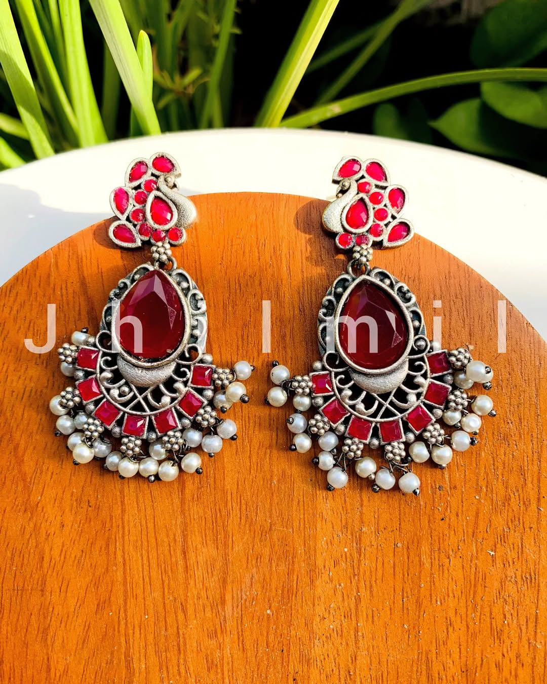 Peacock stone danglers