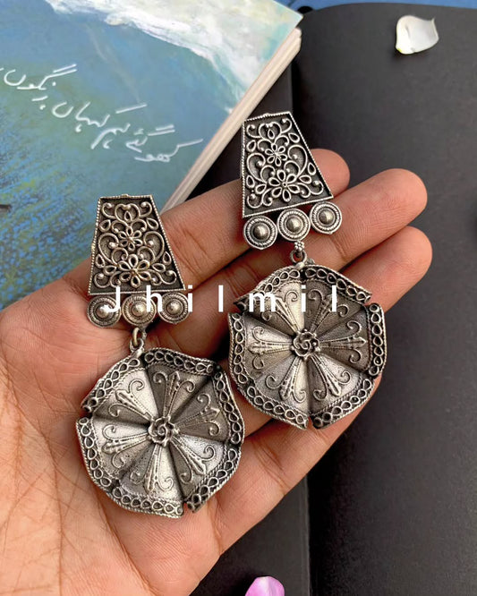 Oxidized floral drop textured earrings 