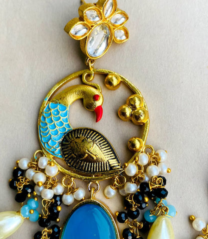 Gold plated kundan peacock earrings