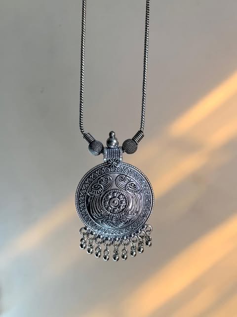 Small Round Carved Pendant