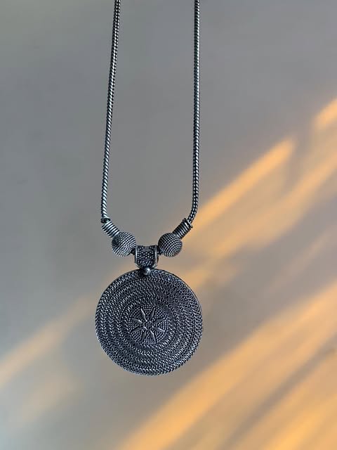 Small Intricate Carved pendant